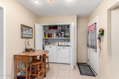 You don't want to miss this charming 2-bedroom townhome in the on Sun City Lakes West and East in Arizona - for sale on GolfHomes.com, golf home, golf lot