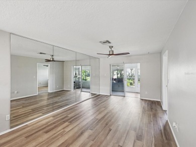 Completely updated, luxurious unit located within the gates of on Seven Springs Golf and Country Club in Florida - for sale on GolfHomes.com, golf home, golf lot