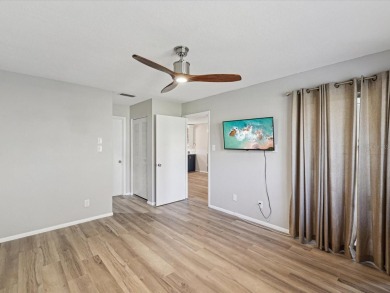 Completely updated, luxurious unit located within the gates of on Seven Springs Golf and Country Club in Florida - for sale on GolfHomes.com, golf home, golf lot