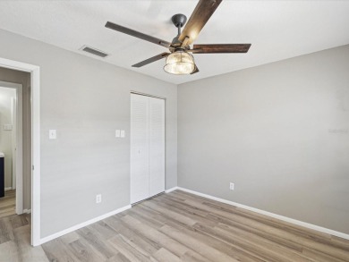 Completely updated, luxurious unit located within the gates of on Seven Springs Golf and Country Club in Florida - for sale on GolfHomes.com, golf home, golf lot