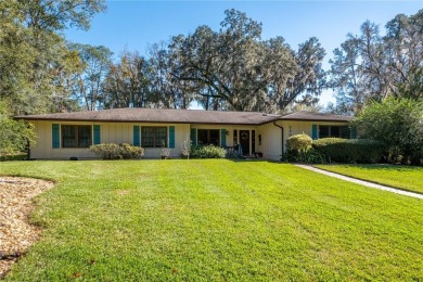 Nestled within the Gainesville Country Club, this extensively on Gainesville Golf and Country Club in Florida - for sale on GolfHomes.com, golf home, golf lot