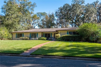 Nestled within the Gainesville Country Club, this extensively on Gainesville Golf and Country Club in Florida - for sale on GolfHomes.com, golf home, golf lot