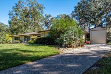 Nestled within the Gainesville Country Club, this extensively on Gainesville Golf and Country Club in Florida - for sale on GolfHomes.com, golf home, golf lot