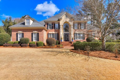 This elegant and updated brick residence is nestled within the on West Lake Country Club in Georgia - for sale on GolfHomes.com, golf home, golf lot