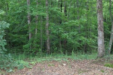 Established subdivision 1.18 acre lot, lot slopes from the road on Sunrise Golf Club in Georgia - for sale on GolfHomes.com, golf home, golf lot