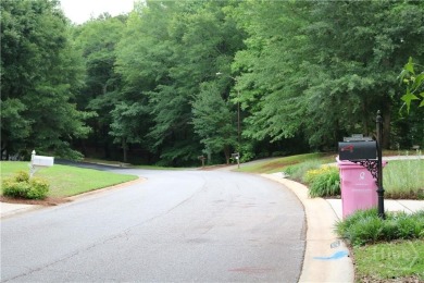 Established subdivision 1.18 acre lot, lot slopes from the road on Sunrise Golf Club in Georgia - for sale on GolfHomes.com, golf home, golf lot
