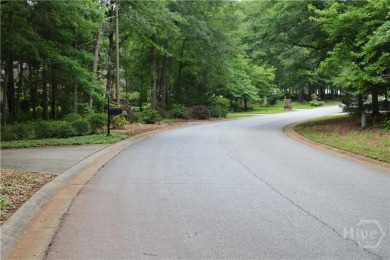 Established subdivision 1.18 acre lot, lot slopes from the road on Sunrise Golf Club in Georgia - for sale on GolfHomes.com, golf home, golf lot