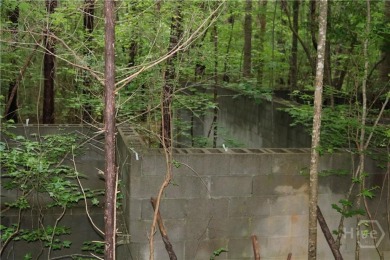 Established subdivision 1.18 acre lot, lot slopes from the road on Sunrise Golf Club in Georgia - for sale on GolfHomes.com, golf home, golf lot
