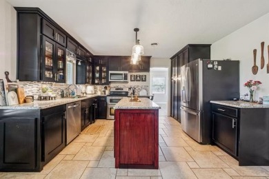 You will want this beautifully, updated home with views of Golf on Ponca City Country Club in Oklahoma - for sale on GolfHomes.com, golf home, golf lot