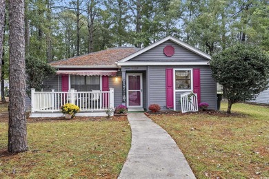 This well-maintained 2-bedroom, 2-bath home offers a bright on Heron Point Golf Club in South Carolina - for sale on GolfHomes.com, golf home, golf lot