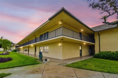 Welcome to this bright corner unit located on the second floor on Largo Golf Course in Florida - for sale on GolfHomes.com, golf home, golf lot