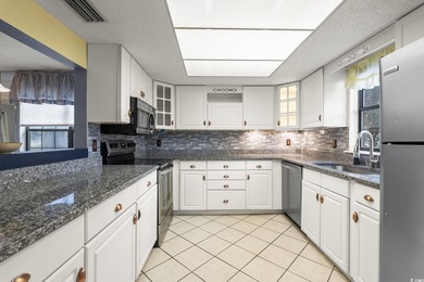 This well-maintained 2-bedroom, 2-bath home offers a bright on Heron Point Golf Club in South Carolina - for sale on GolfHomes.com, golf home, golf lot