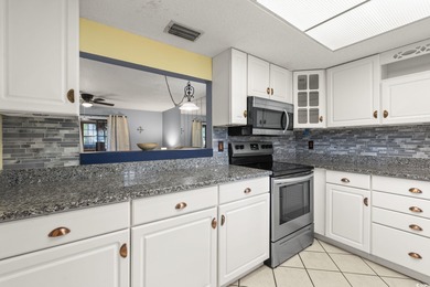 This well-maintained 2-bedroom, 2-bath home offers a bright on Heron Point Golf Club in South Carolina - for sale on GolfHomes.com, golf home, golf lot