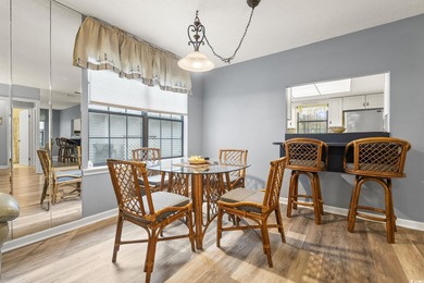 This well-maintained 2-bedroom, 2-bath home offers a bright on Heron Point Golf Club in South Carolina - for sale on GolfHomes.com, golf home, golf lot