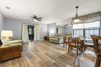 This well-maintained 2-bedroom, 2-bath home offers a bright on Heron Point Golf Club in South Carolina - for sale on GolfHomes.com, golf home, golf lot