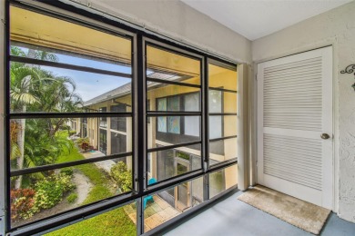 Welcome to this bright corner unit located on the second floor on Largo Golf Course in Florida - for sale on GolfHomes.com, golf home, golf lot