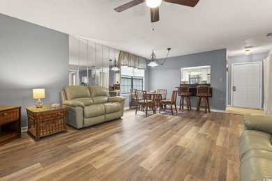 This well-maintained 2-bedroom, 2-bath home offers a bright on Heron Point Golf Club in South Carolina - for sale on GolfHomes.com, golf home, golf lot