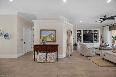 This stunning 2,748 sq. ft. three-bedroom plus den residence on Pelican Marsh Golf Club in Florida - for sale on GolfHomes.com, golf home, golf lot