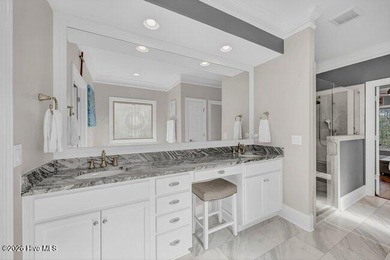 Experience luxury in this exquisite 3-bedroom, 3-bath all-brick on Cape Fear National At Brunswick Forest in North Carolina - for sale on GolfHomes.com, golf home, golf lot