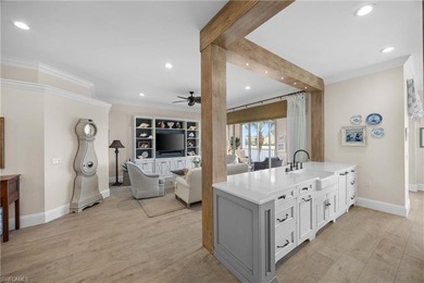 This stunning 2,748 sq. ft. three-bedroom plus den residence on Pelican Marsh Golf Club in Florida - for sale on GolfHomes.com, golf home, golf lot