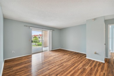 Spacious END UNIT with 3 bedrooms and 2 full bathrooms WITH A on Hunters Green Country Club in Florida - for sale on GolfHomes.com, golf home, golf lot