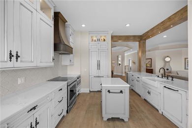 This stunning 2,748 sq. ft. three-bedroom plus den residence on Pelican Marsh Golf Club in Florida - for sale on GolfHomes.com, golf home, golf lot