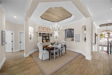 This stunning 2,748 sq. ft. three-bedroom plus den residence on Pelican Marsh Golf Club in Florida - for sale on GolfHomes.com, golf home, golf lot