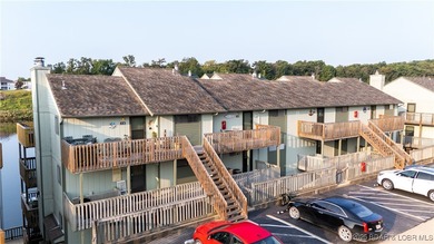 The Complete Condo Package ~ Now Even Better! This charming on Seasons Ridge At Four Seasons in Missouri - for sale on GolfHomes.com, golf home, golf lot