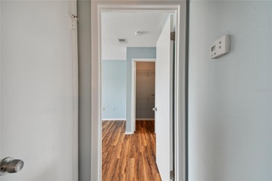 Spacious END UNIT with 3 bedrooms and 2 full bathrooms WITH A on Hunters Green Country Club in Florida - for sale on GolfHomes.com, golf home, golf lot