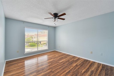 Spacious END UNIT with 3 bedrooms and 2 full bathrooms WITH A on Hunters Green Country Club in Florida - for sale on GolfHomes.com, golf home, golf lot