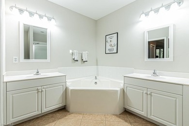 Beautifully updated 3-bedroom, 2-bath, 2 car garage condo on Cypress Woods Golf and Country Club in Florida - for sale on GolfHomes.com, golf home, golf lot