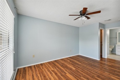 Spacious END UNIT with 3 bedrooms and 2 full bathrooms WITH A on Hunters Green Country Club in Florida - for sale on GolfHomes.com, golf home, golf lot