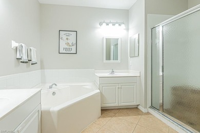 Beautifully updated 3-bedroom, 2-bath, 2 car garage condo on Cypress Woods Golf and Country Club in Florida - for sale on GolfHomes.com, golf home, golf lot