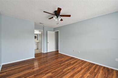 Spacious END UNIT with 3 bedrooms and 2 full bathrooms WITH A on Hunters Green Country Club in Florida - for sale on GolfHomes.com, golf home, golf lot