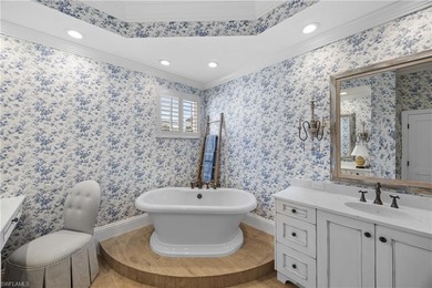 This stunning 2,748 sq. ft. three-bedroom plus den residence on Pelican Marsh Golf Club in Florida - for sale on GolfHomes.com, golf home, golf lot