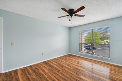 Spacious END UNIT with 3 bedrooms and 2 full bathrooms WITH A on Hunters Green Country Club in Florida - for sale on GolfHomes.com, golf home, golf lot