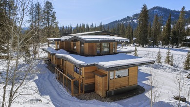 Step into this premier mountain modern home, perfectly sited on on Snake River Sporting Club in Wyoming - for sale on GolfHomes.com, golf home, golf lot