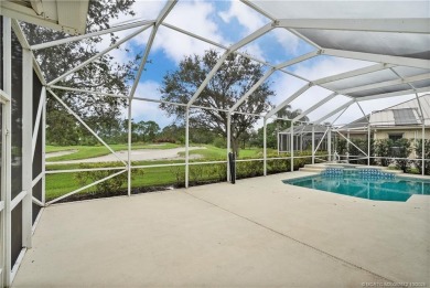 Step inside and fall in love with the view - a sparkling pool on Eagle Marsh Golf Club in Florida - for sale on GolfHomes.com, golf home, golf lot
