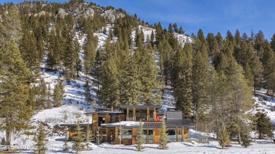 Step into this premier mountain modern home, perfectly sited on on Snake River Sporting Club in Wyoming - for sale on GolfHomes.com, golf home, golf lot