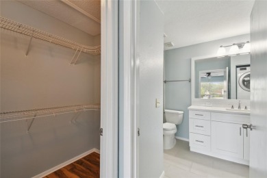 Spacious END UNIT with 3 bedrooms and 2 full bathrooms WITH A on Hunters Green Country Club in Florida - for sale on GolfHomes.com, golf home, golf lot