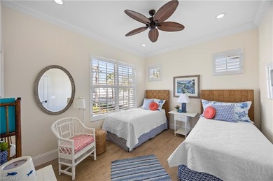 This stunning 2,748 sq. ft. three-bedroom plus den residence on Pelican Marsh Golf Club in Florida - for sale on GolfHomes.com, golf home, golf lot