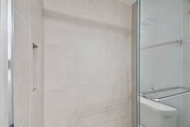 Spacious END UNIT with 3 bedrooms and 2 full bathrooms WITH A on Hunters Green Country Club in Florida - for sale on GolfHomes.com, golf home, golf lot