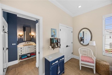 This stunning 2,748 sq. ft. three-bedroom plus den residence on Pelican Marsh Golf Club in Florida - for sale on GolfHomes.com, golf home, golf lot