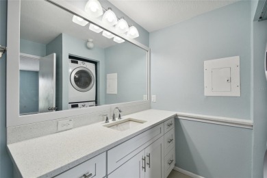Spacious END UNIT with 3 bedrooms and 2 full bathrooms WITH A on Hunters Green Country Club in Florida - for sale on GolfHomes.com, golf home, golf lot