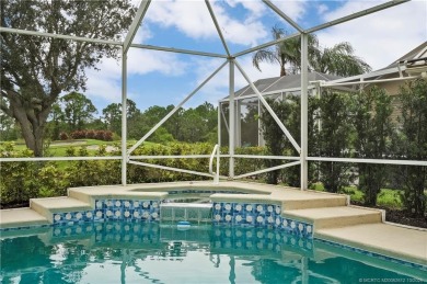 Step inside and fall in love with the view - a sparkling pool on Eagle Marsh Golf Club in Florida - for sale on GolfHomes.com, golf home, golf lot
