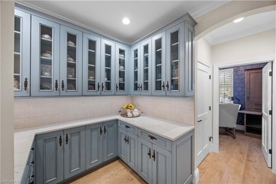 This stunning 2,748 sq. ft. three-bedroom plus den residence on Pelican Marsh Golf Club in Florida - for sale on GolfHomes.com, golf home, golf lot