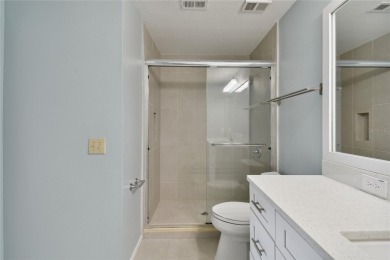 Spacious END UNIT with 3 bedrooms and 2 full bathrooms WITH A on Hunters Green Country Club in Florida - for sale on GolfHomes.com, golf home, golf lot