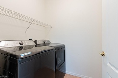 Beautifully updated 3-bedroom, 2-bath, 2 car garage condo on Cypress Woods Golf and Country Club in Florida - for sale on GolfHomes.com, golf home, golf lot