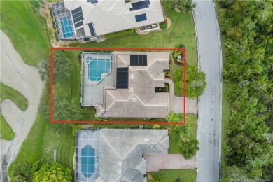 Step inside and fall in love with the view - a sparkling pool on Eagle Marsh Golf Club in Florida - for sale on GolfHomes.com, golf home, golf lot