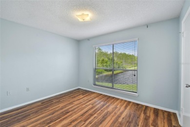 Spacious END UNIT with 3 bedrooms and 2 full bathrooms WITH A on Hunters Green Country Club in Florida - for sale on GolfHomes.com, golf home, golf lot